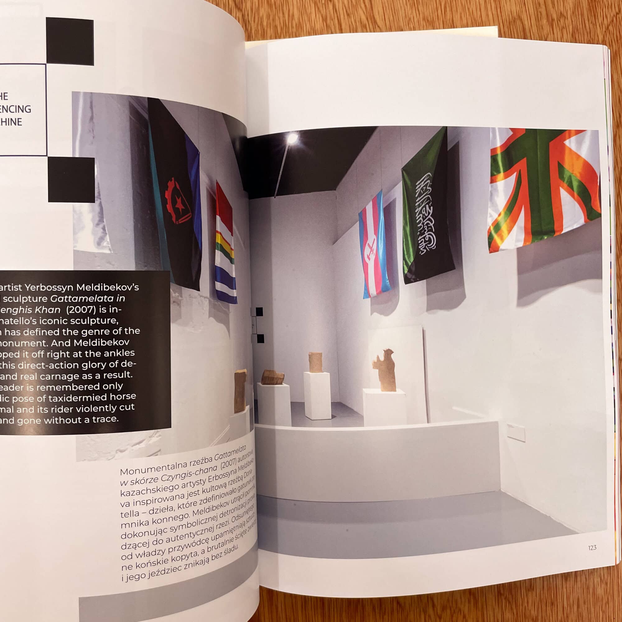 Photograph of flags and sculptures at Verdurin art space in East London, showcasing contemporary cultural and political artworks.