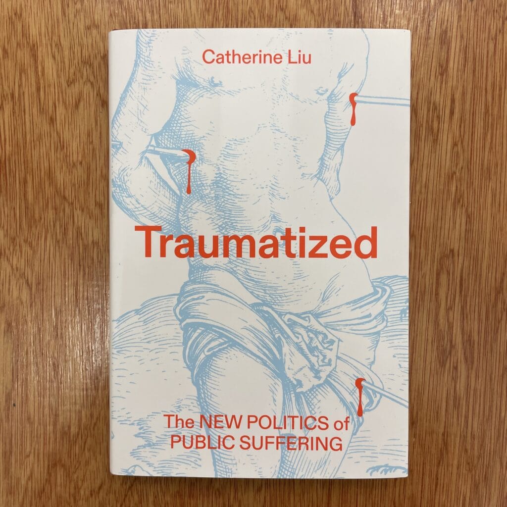 Cover of 'Traumatized' by Catherine Liu featuring a line drawing of a human torso with red marks.
