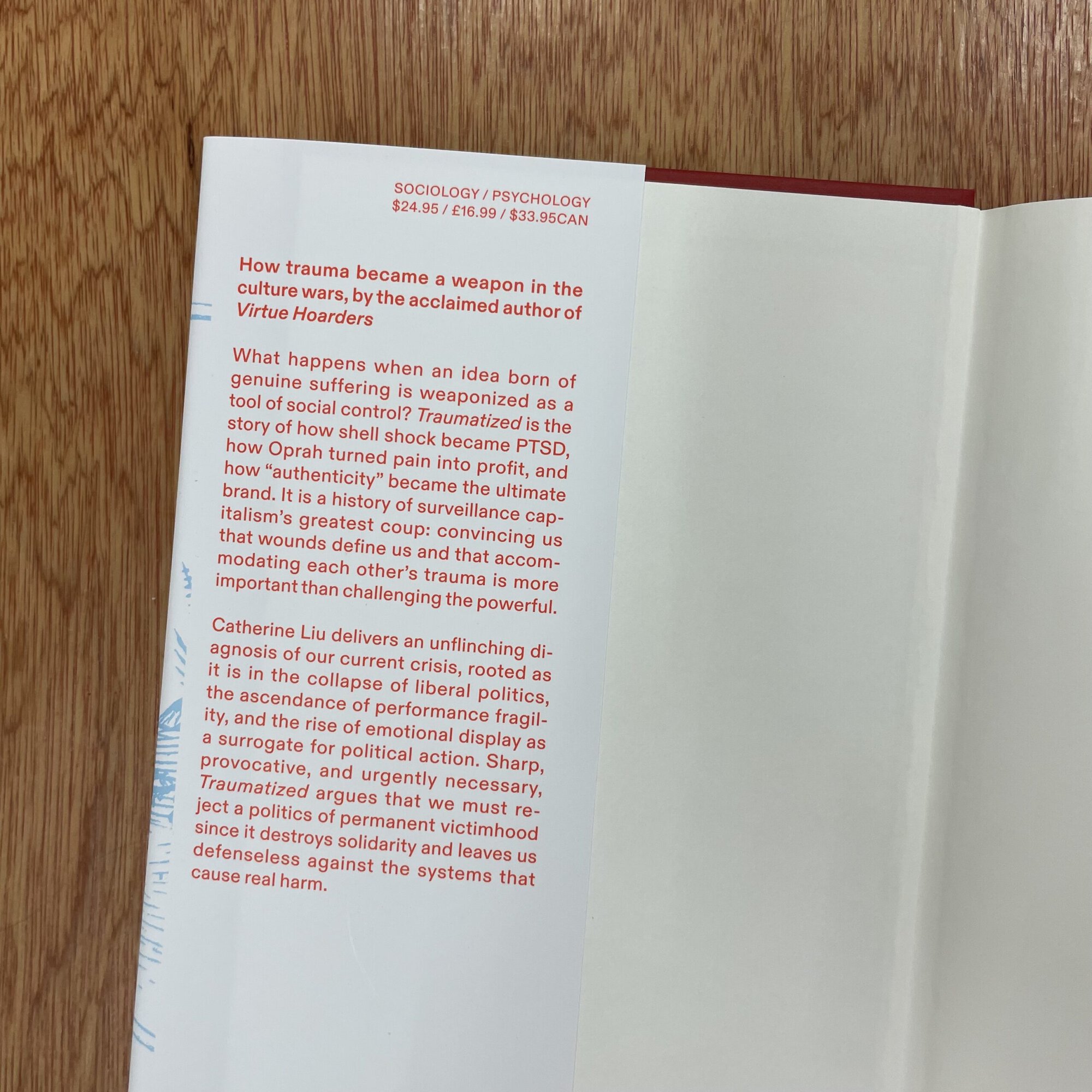 Open book showing a page with text discussing trauma, culture wars, and social suffering, related to Verdurin cultural project in East London.