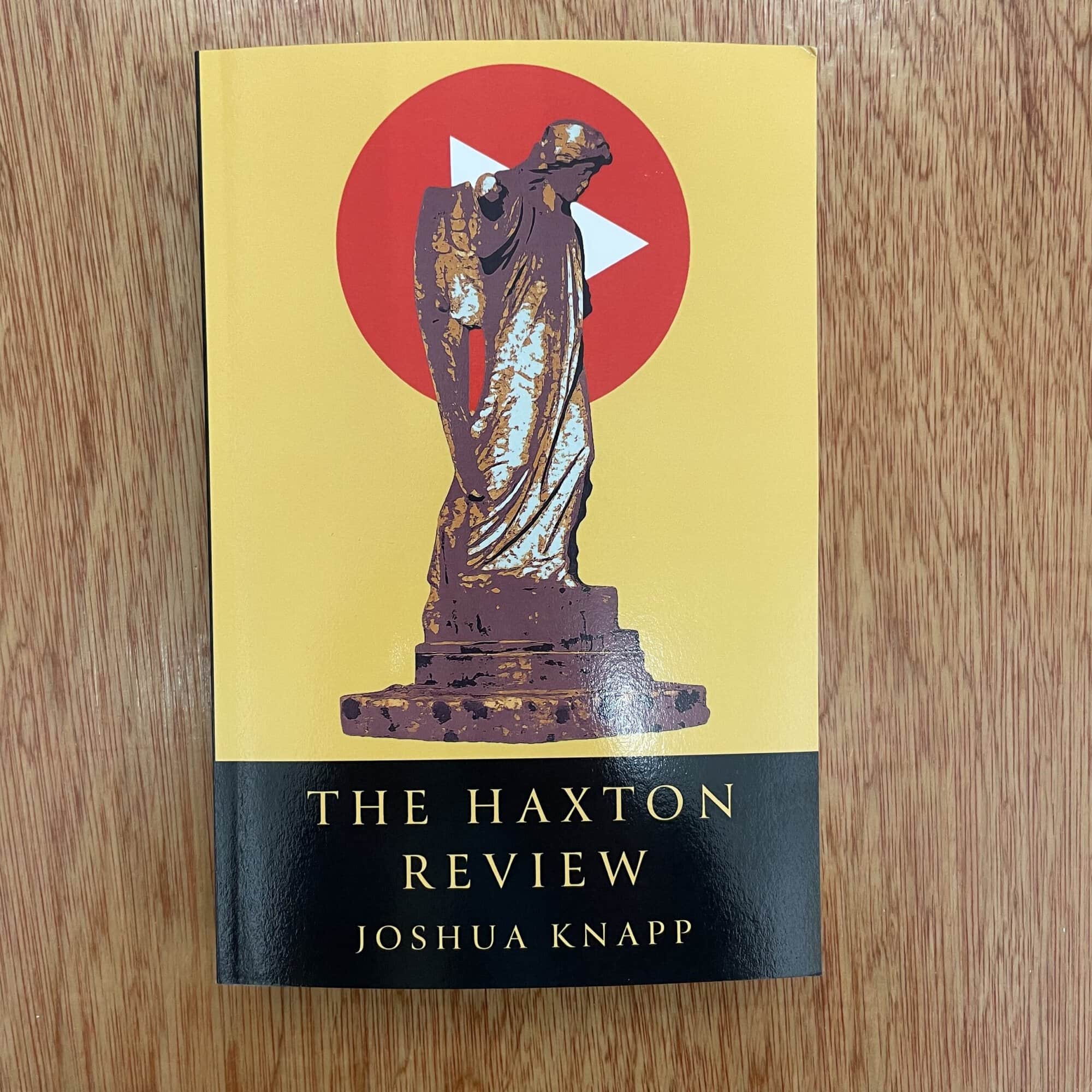 Cover of 'The Haxton Review' by Joshua Knapp featuring a classical statue with a play button symbol in the background.