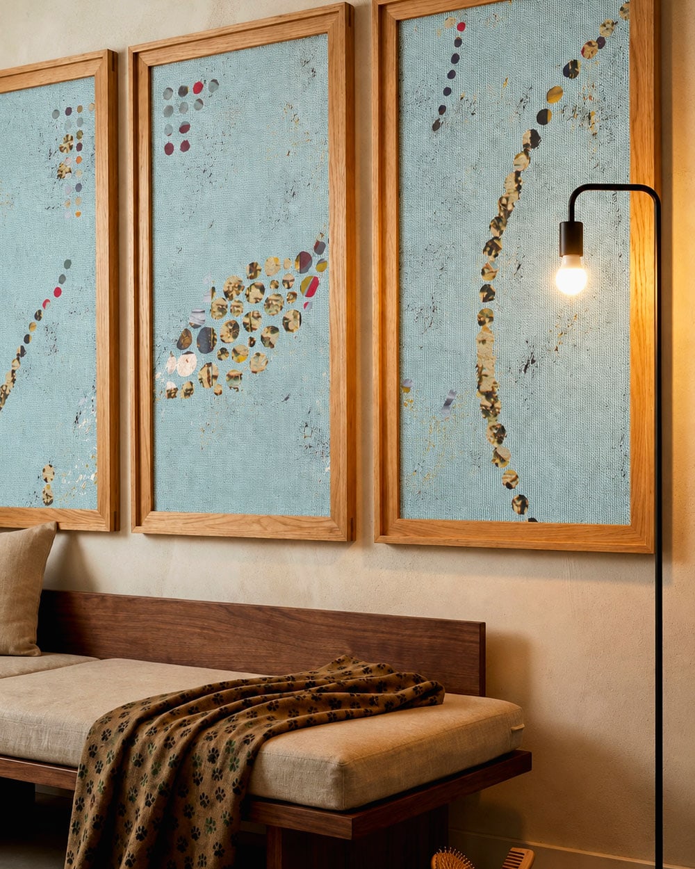 Teal Mid-Century Wallpaper displayed as three framed art panels above a wooden bench