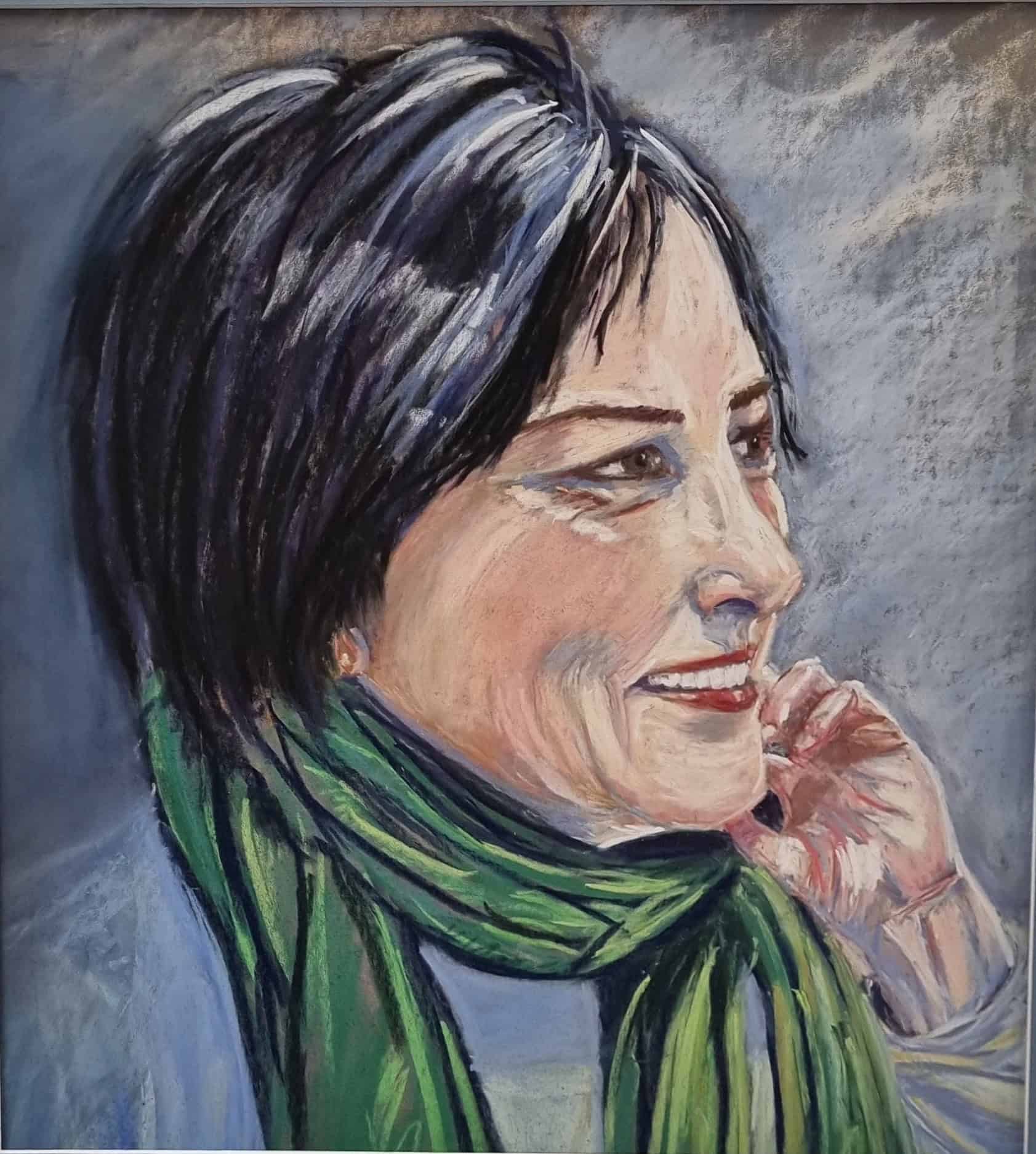 Portrait of a woman with short black hair and green scarf, pastel artwork.