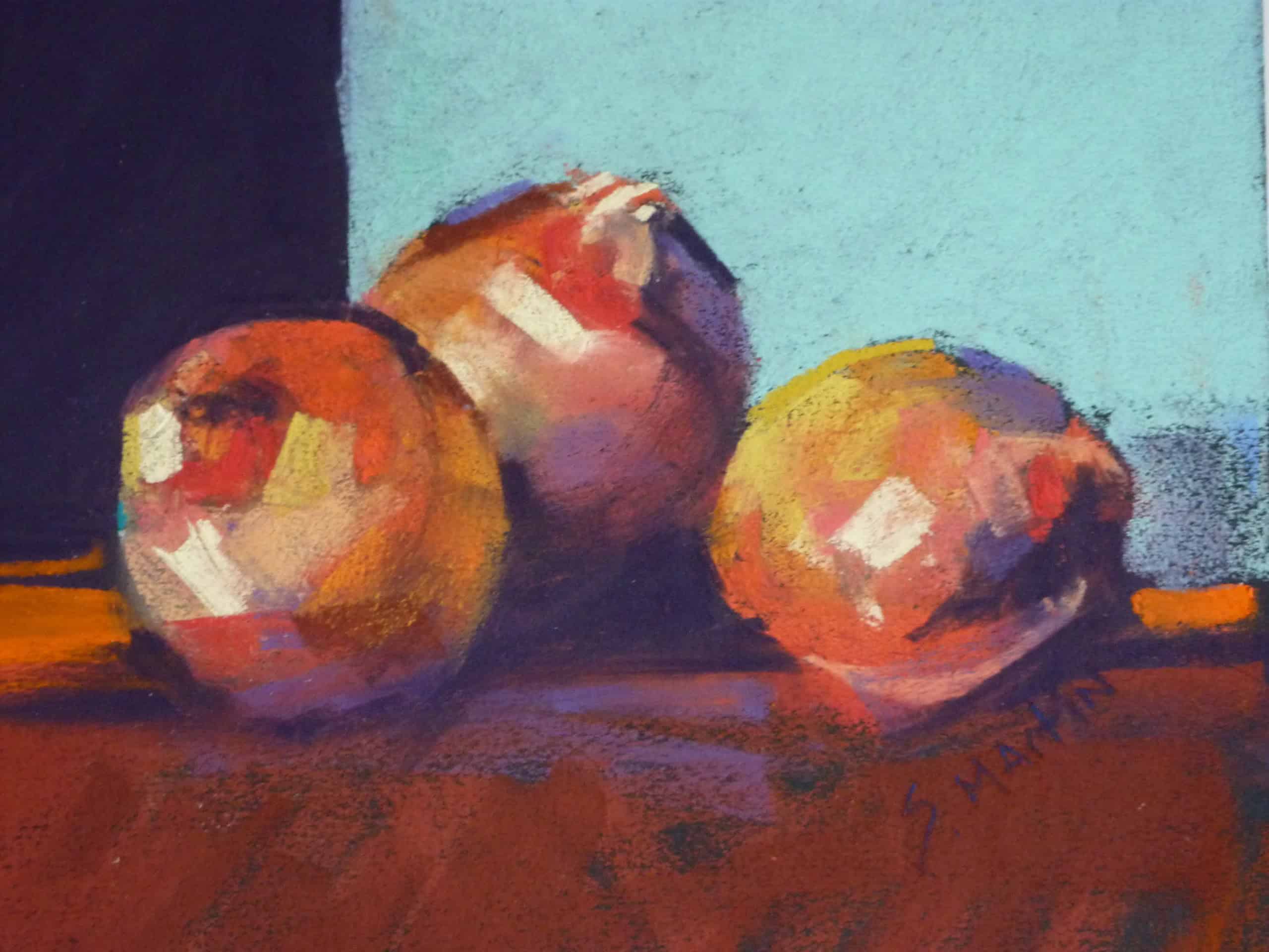 Soft Pastel painting of three red onions on a table with a blue background - by Sharon Martin