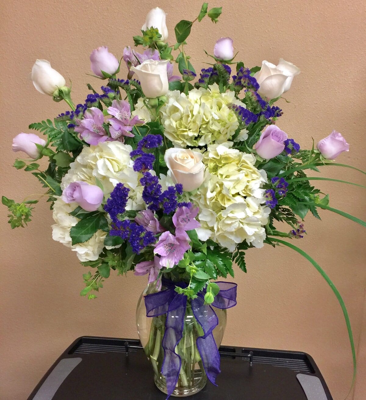 white hydrangeas and lavender roses