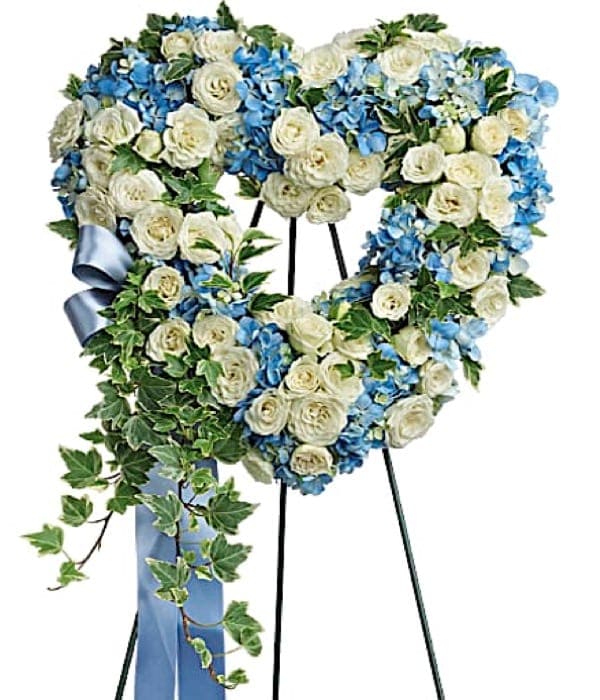 white and blue funeral heart