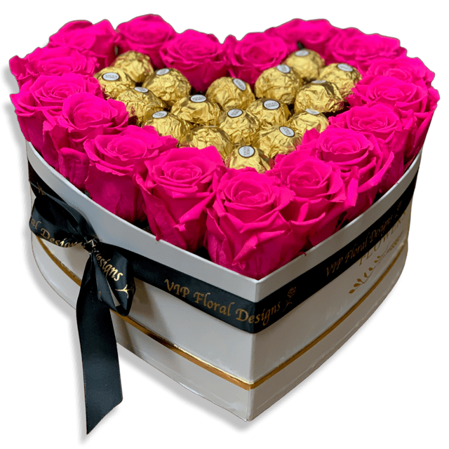 hot pink roses preserved in a hat flower box las vegas florist