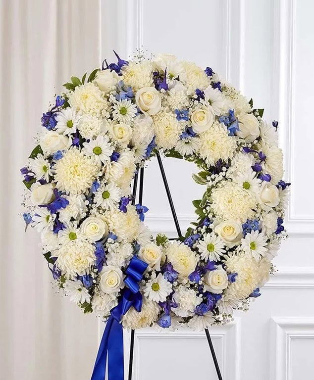 White and blue funeral Wreath