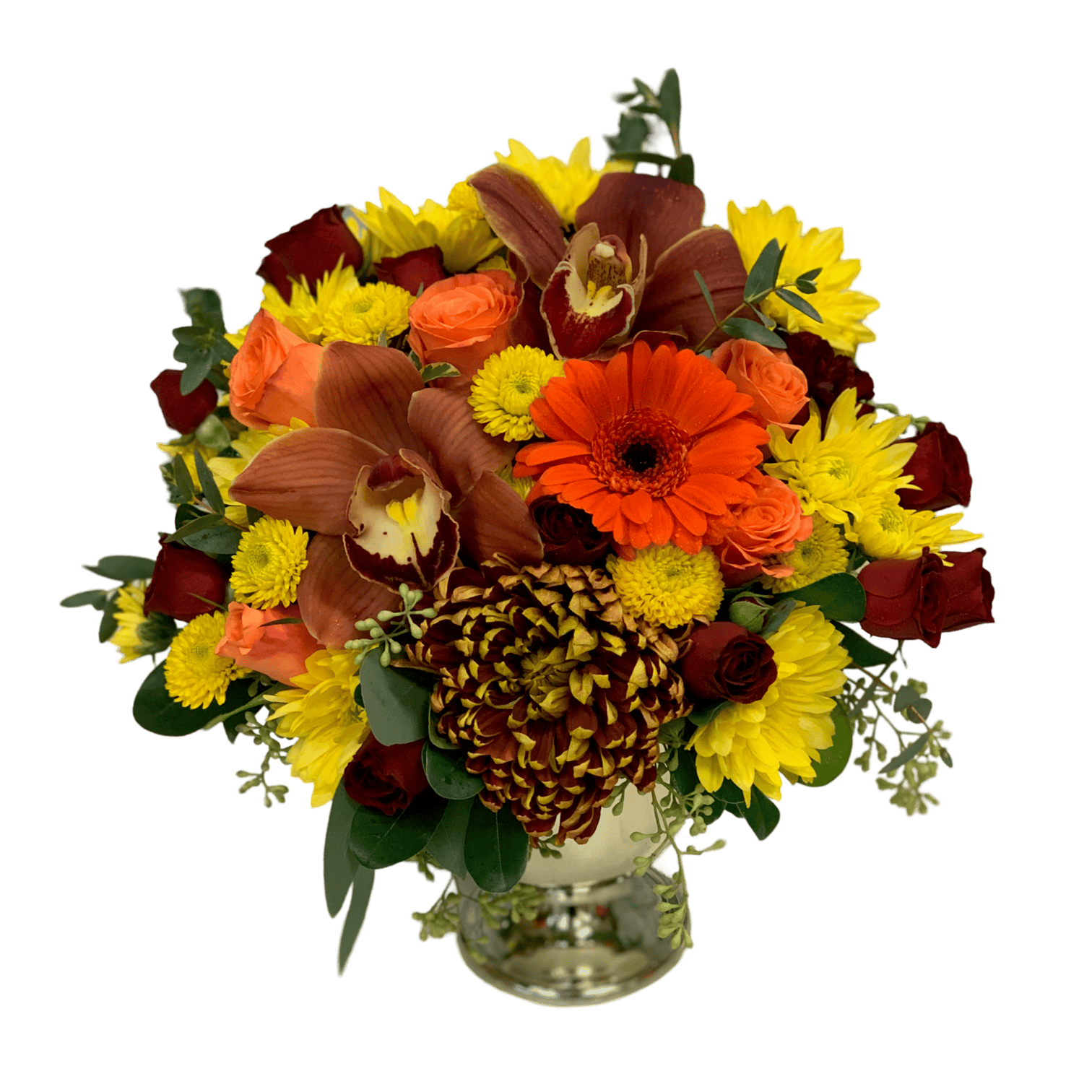 Pink, orange, yellow, and red floral bouquet with roses, gerbera daisies, orchids, and greenery in a glass vase.