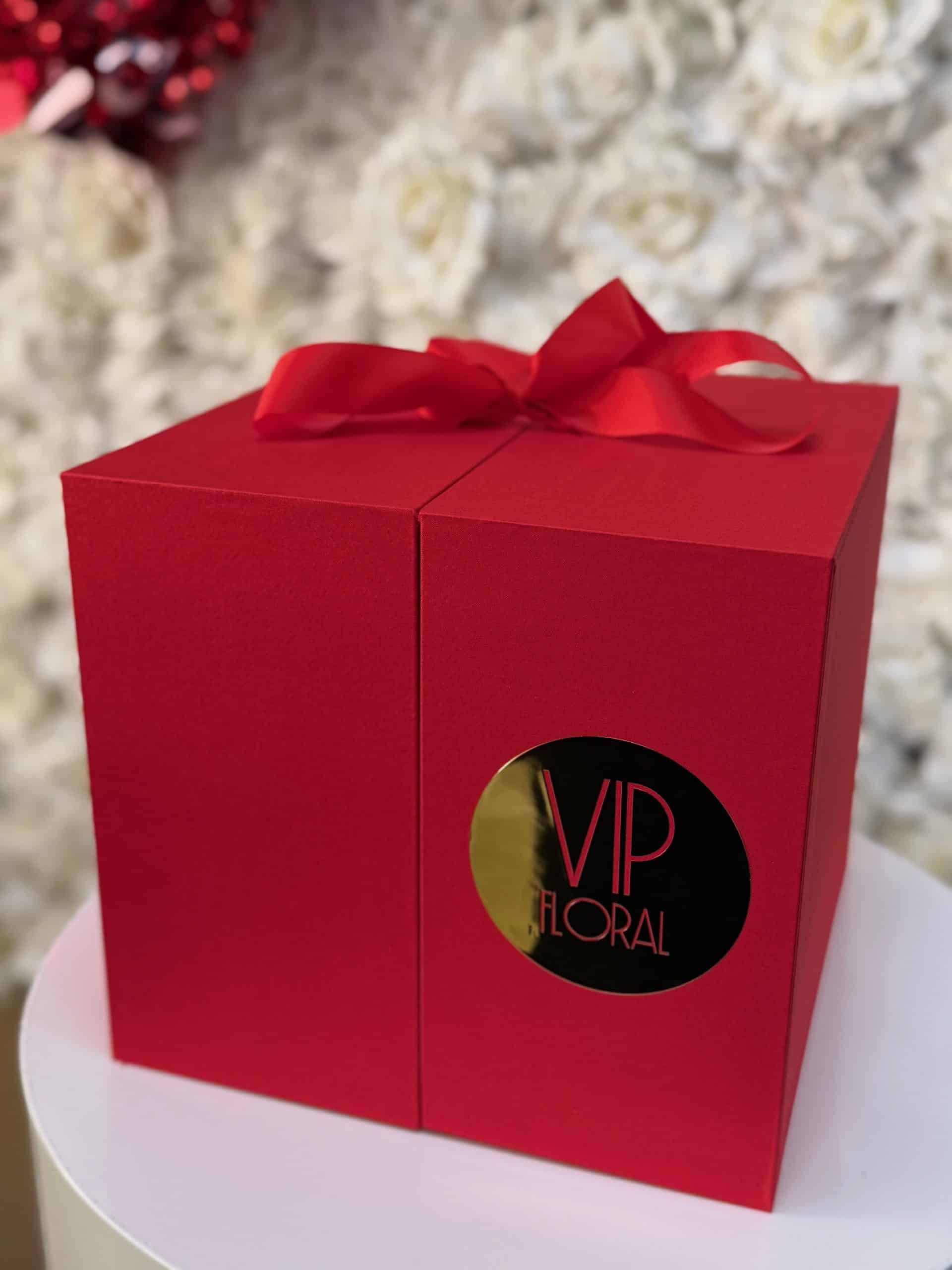 Luxurious red box with long-lasting roses for special occasions.