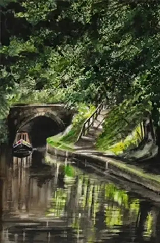 Canal boat approaching lush, wooded tunnel entrance