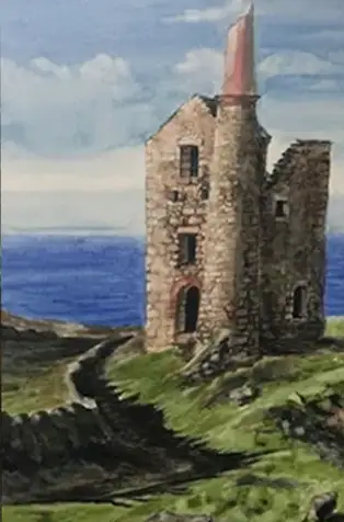 Old stone tower by the ocean on grassy hill.