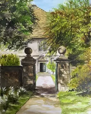 Charming cottage with garden path and stone gate