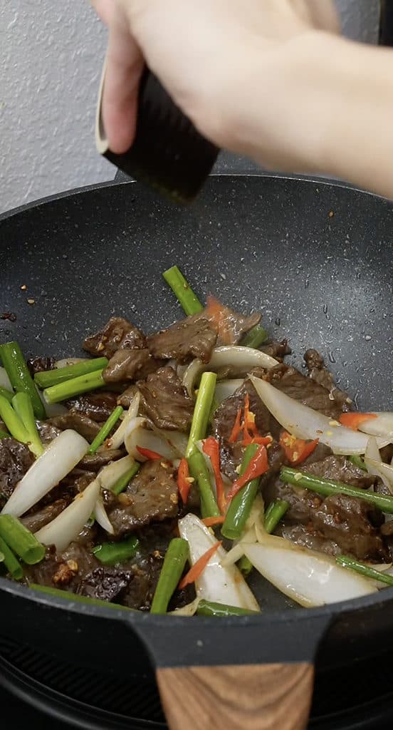 garnish with green onion and chili