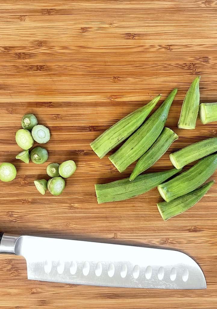 Cut tough tips of okra