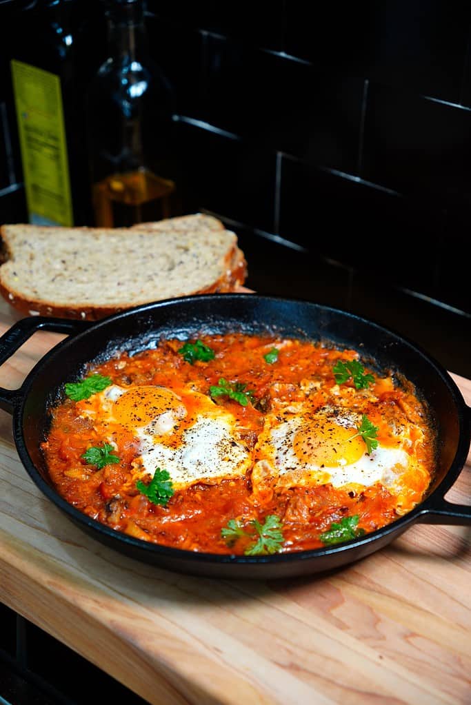 Easy recipe using sardines for breakfast with eggs and tomatoes.