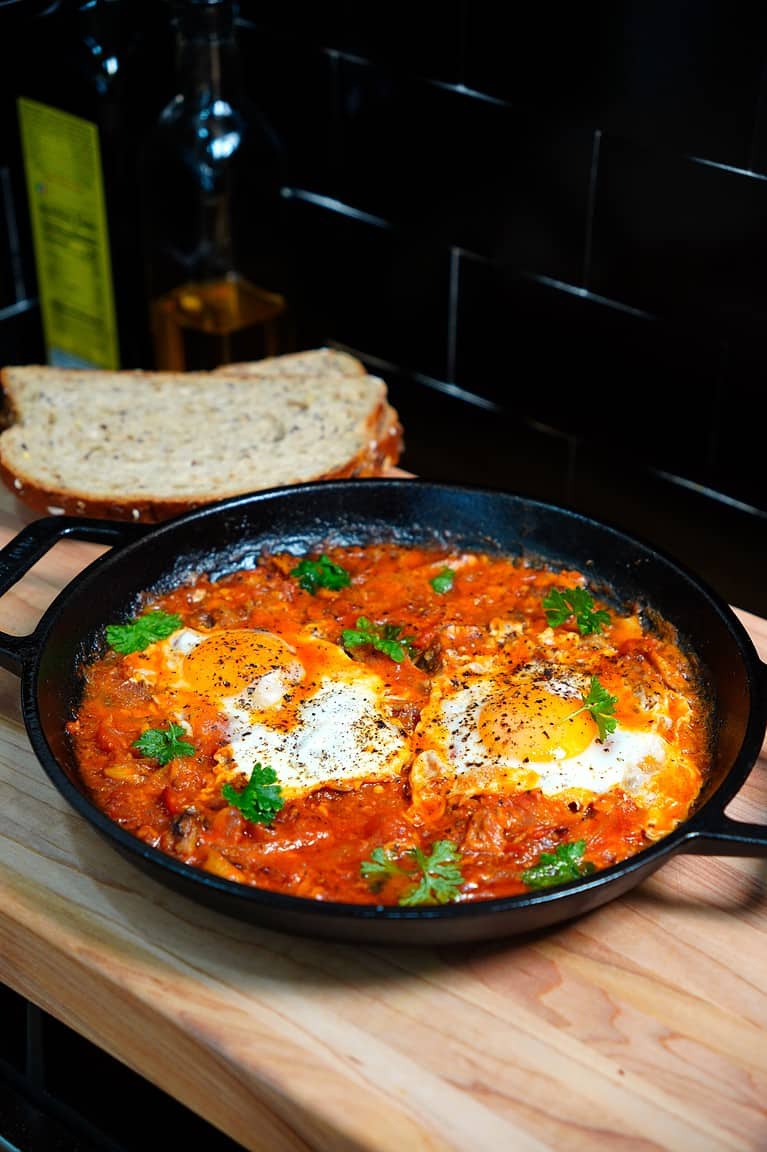 Easy recipe using sardines for breakfast with eggs and tomatoes.