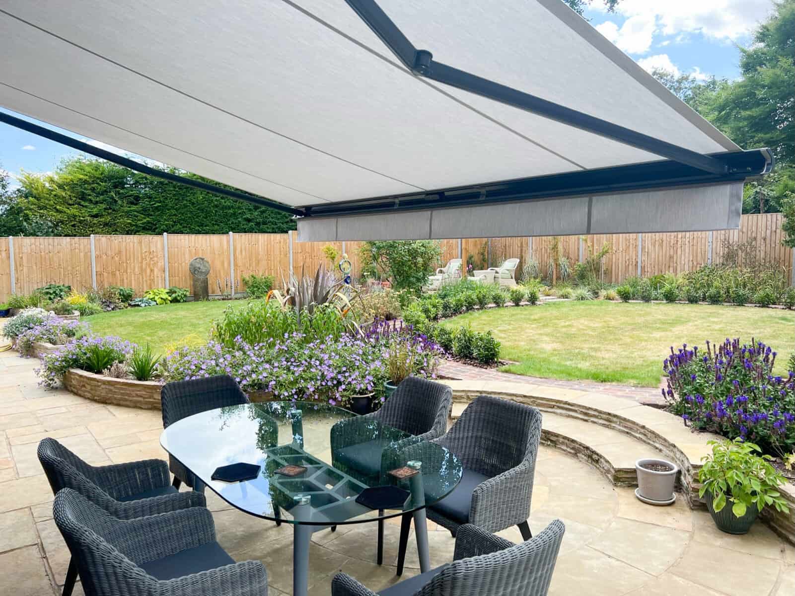 awnings, garden awning, grey weinor awning over garden patio