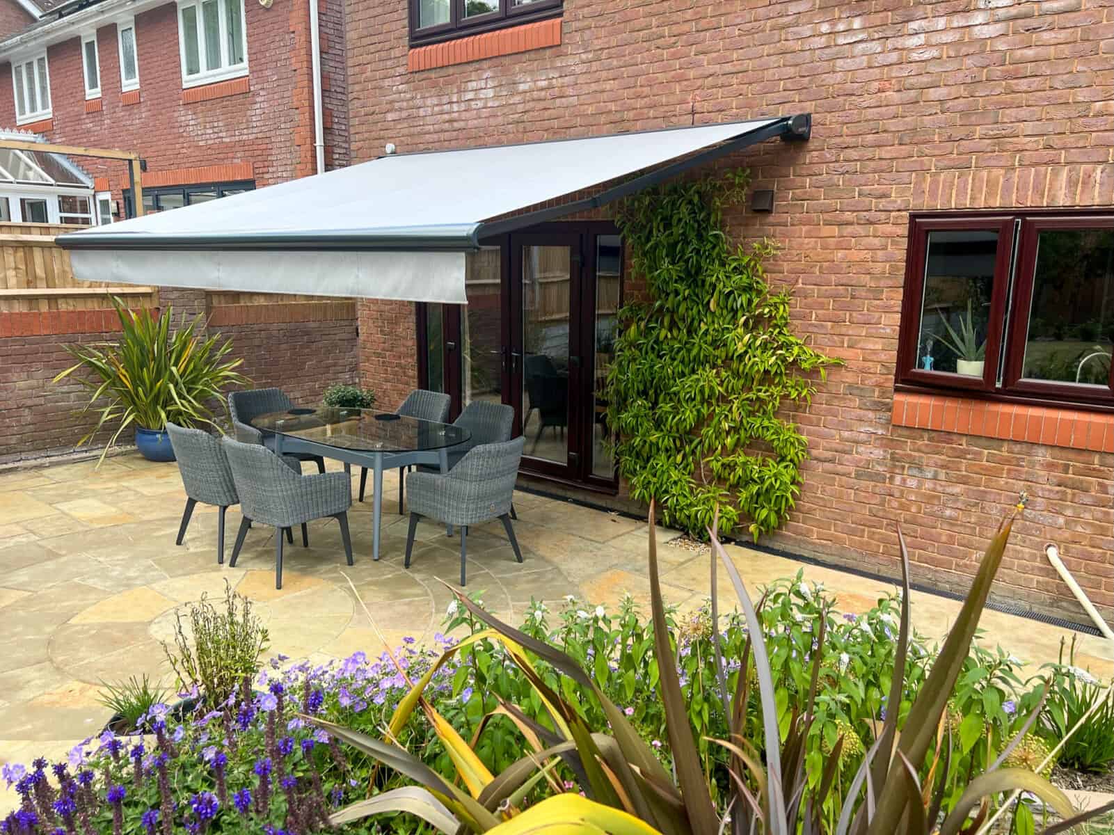Weinor Somfy motorised awning with sun and wind sensors Stockbridge Hampshire