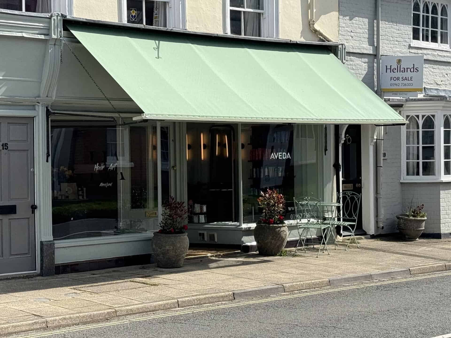 Commercial Awning Case Study: Traditional Drop Arm Awning Recover in Alresford, Hampshire