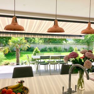 Keeping your home cool in summer with motorised blinds and awnings