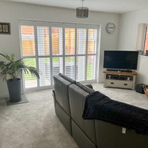 living room full height shutters in Wickham Hampshire