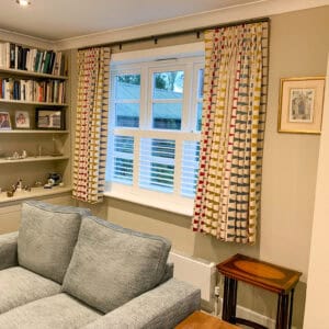 Café-style shutters providing privacy while allowing natural light into a Hampshire home