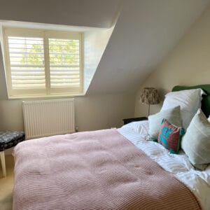Plantation shutters fitted to traditional sash windows in a Winchester home