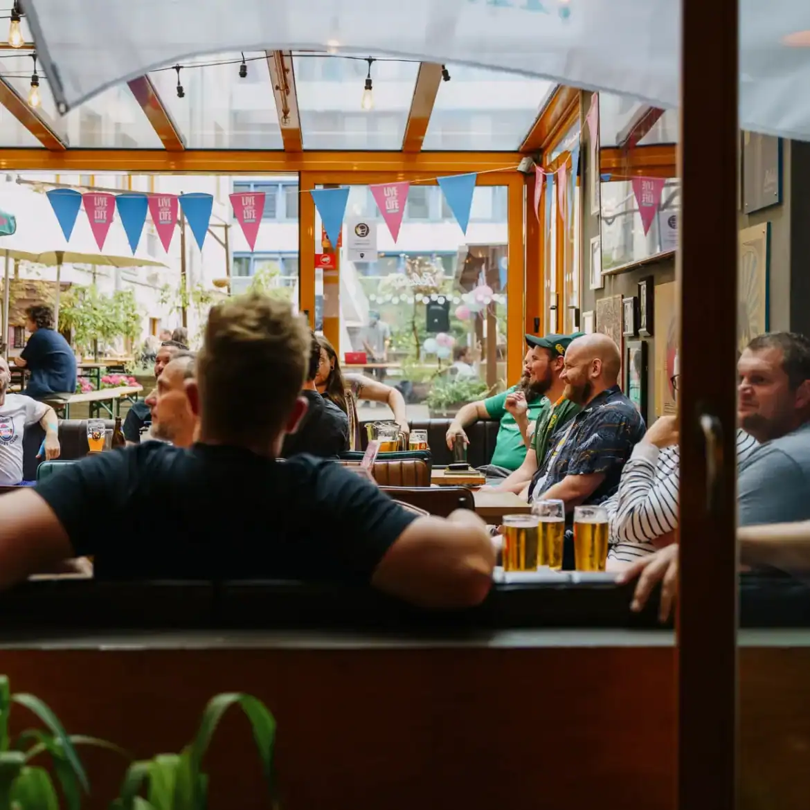 Football fans watch the world cup at belushi's sports bar in Berlin Mitte with great atmosphere