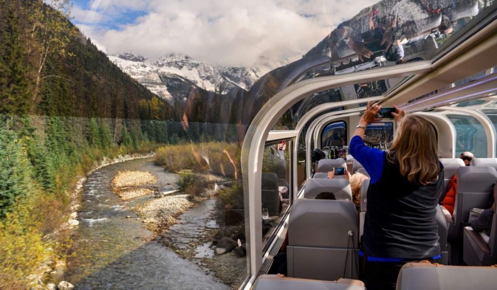 The Rocky Mountaineer gliding through Canada’s spectacular Rockies — a world-famous luxury train journey and unforgettable bucket list adventure with WorldLee Journeys.
