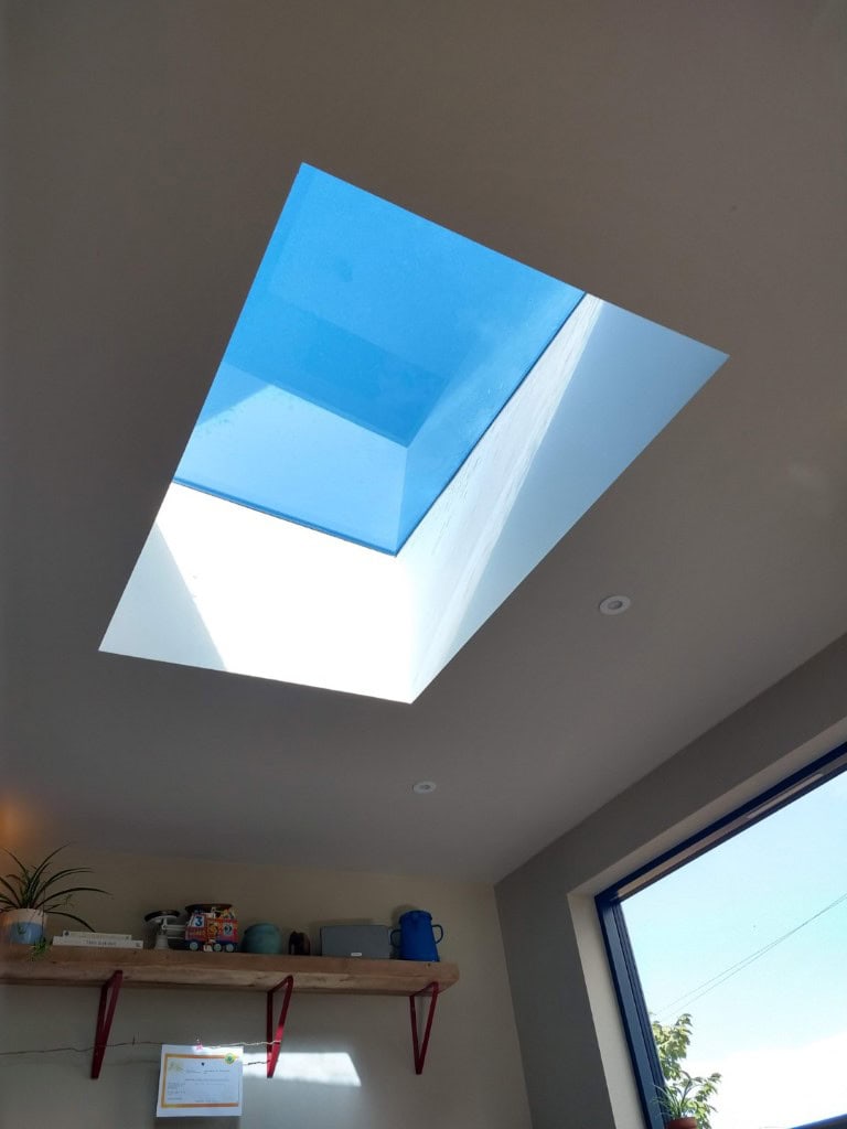 Bright blue skylight for natural lighting.