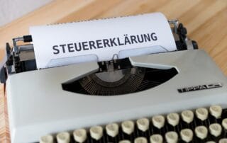 Typewriter with tax document titled 'Steuererklärung' for Australian business SEO.