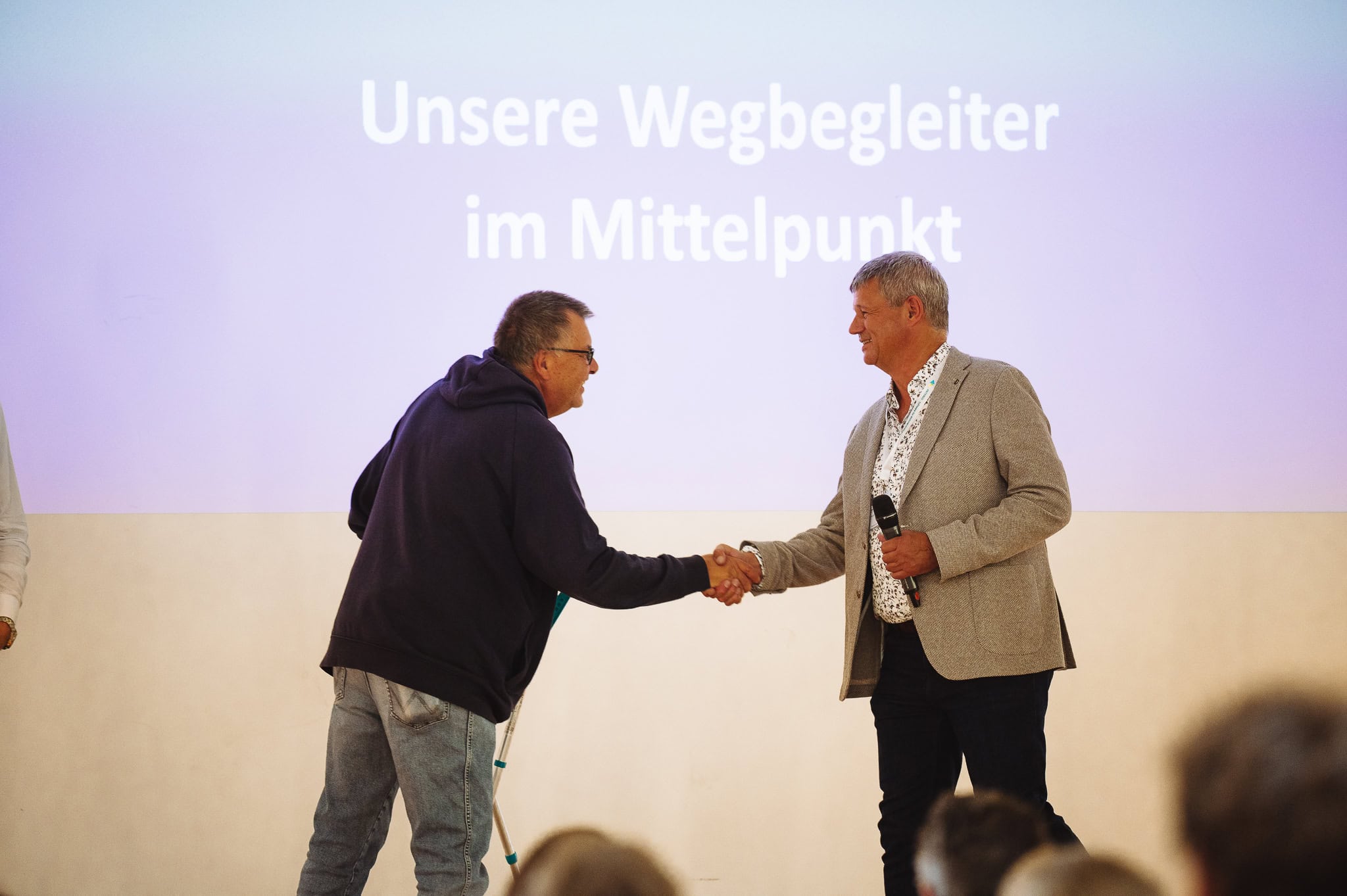 Zwei Männer bei der Preisverleihung auf dem ANTRAGO Anwendertreffen 2024.