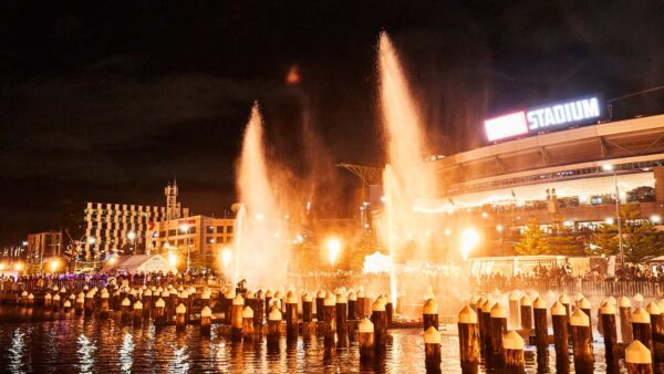 Night scene of fireworks and water fountains at Firelight Festival Melbourne.
