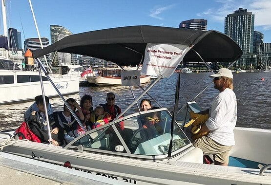 Family enjoying a boat tour in Melbourne with Boat-4-Hire.