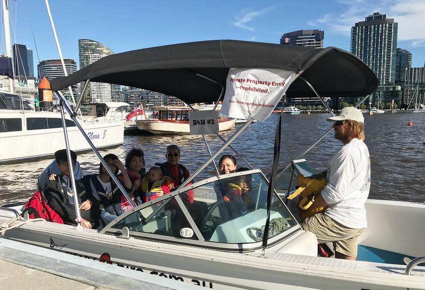 Family enjoying a boat tour in Melbourne with Boat-4-Hire.