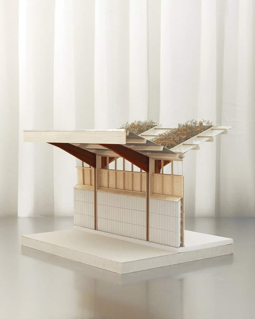 Model af boligbyggeri med moderne design og bæredygtige materialer.