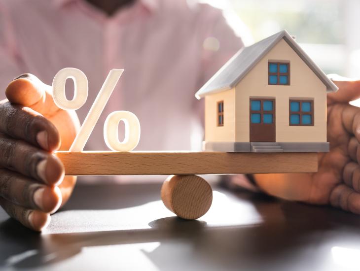 Hypotheekadvies: een huis met een percentage van hypotheekrente