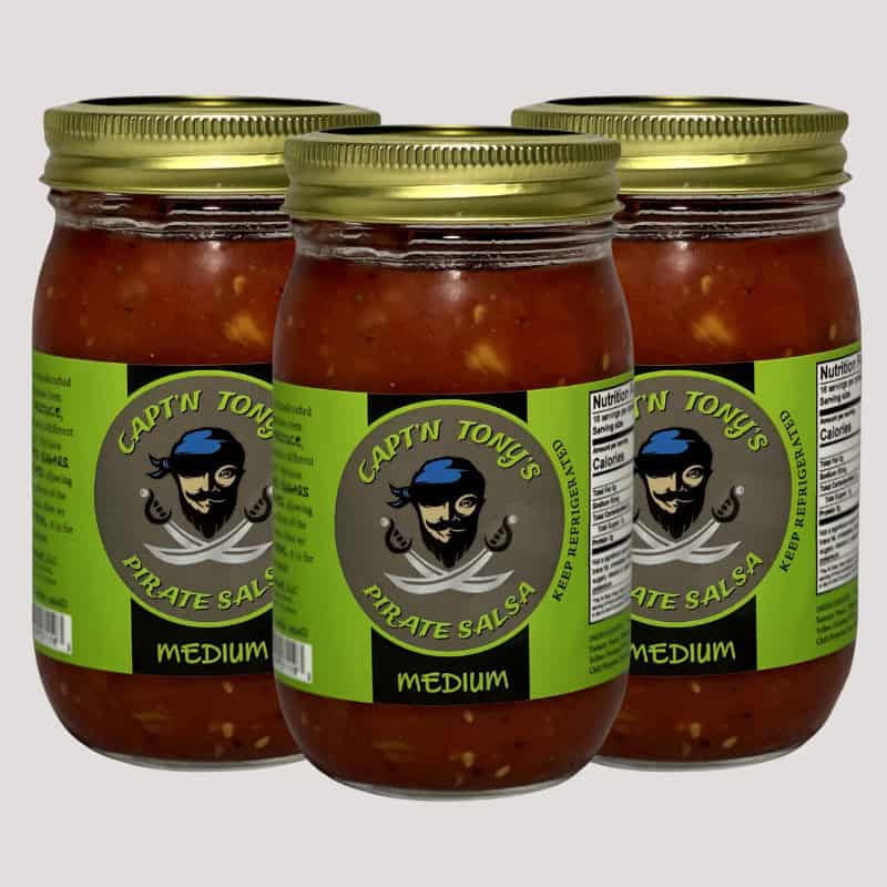 Three jars of Capt'n Tony's Medium Pirate Salsa with green labels and gold lids.