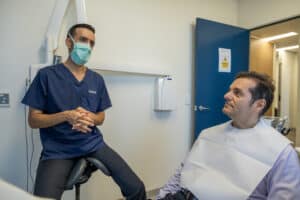 Brisbane CBD dentist discussing cosmetic dentistry options with a patient