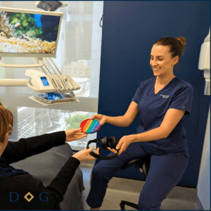 Dental sedationist in brisbane cbd reassuring an anxious dental patient