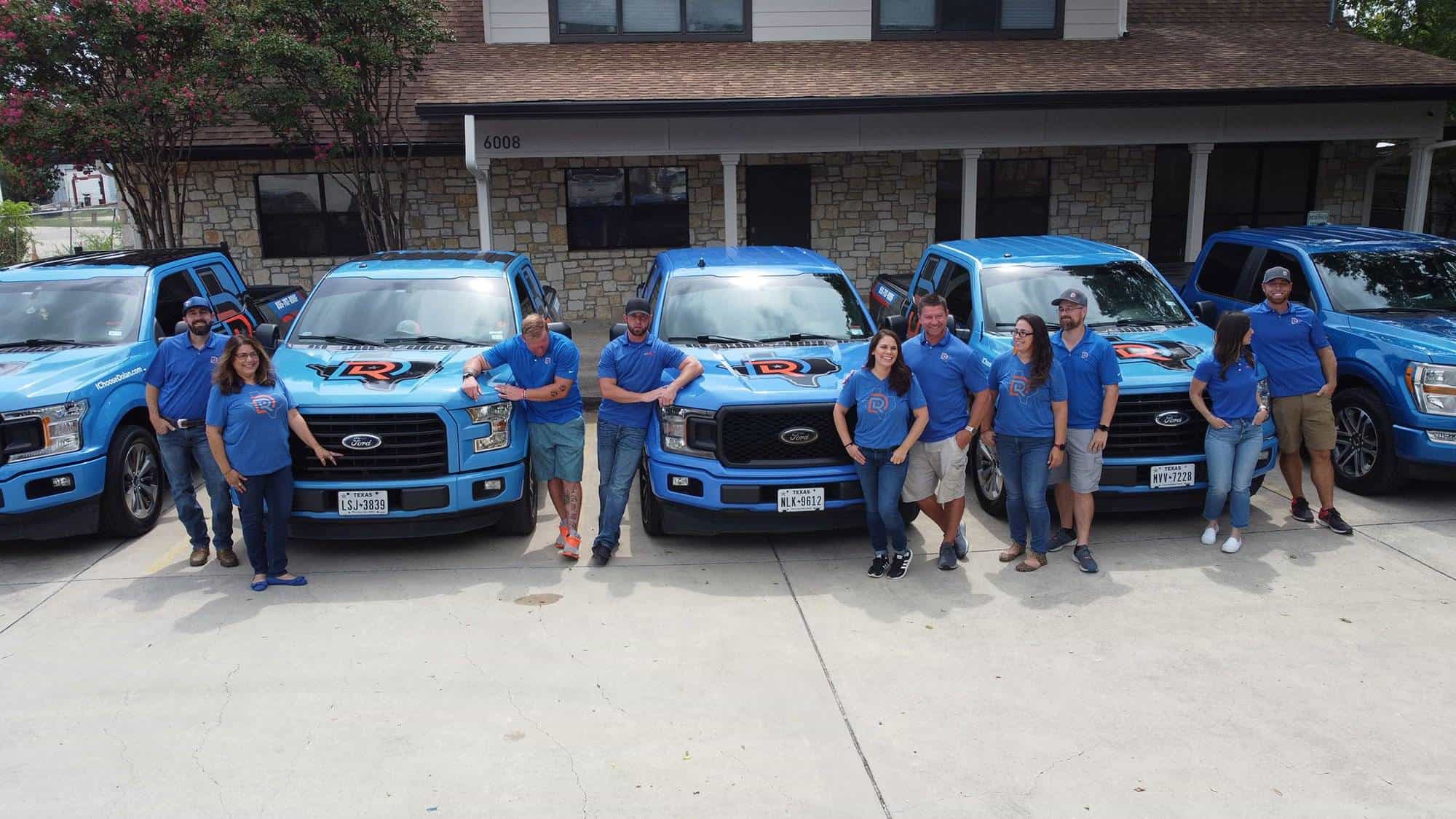 Dolan team with trucks