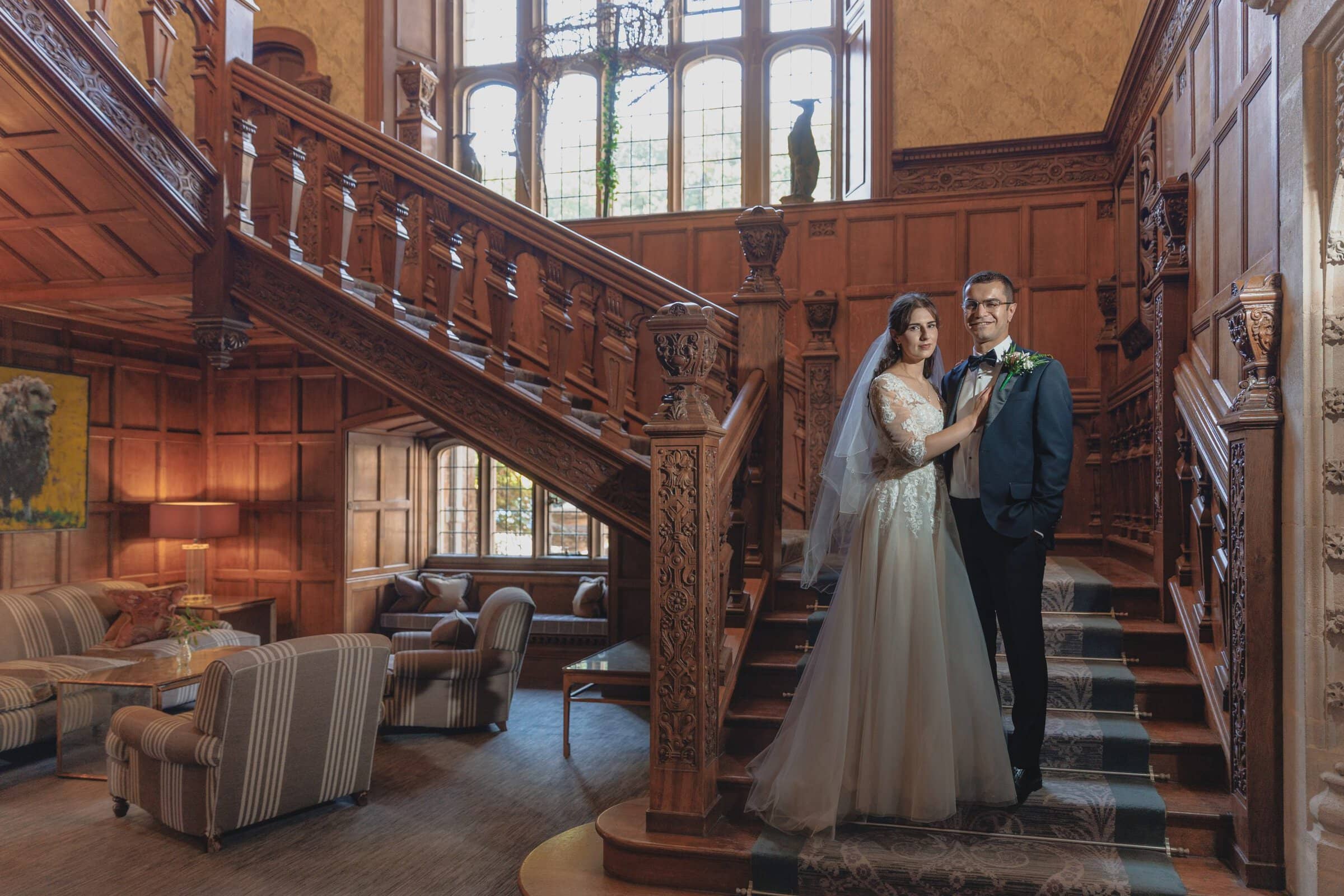 Louise + Amjad | Bovey Castle Micro Wedding, Dartmoor 30 Louise and Amjad Bovey Castle micro wedding photography — couple portrait on the staircase