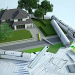 Blueprints and architectural plans for a residential property, with drafting tools, energy efficiency graphs, and a coffee mug, illustrating legal expertise in real estate and construction law.