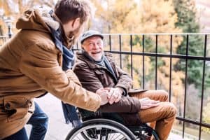 Accessible elderly care assistance for seniors with mobility challenges, highlighting compassionate support and medical aid.