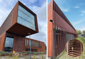Galvanised perforated steel panels used in modern architectural building design for enhanced aesthetics and durability.