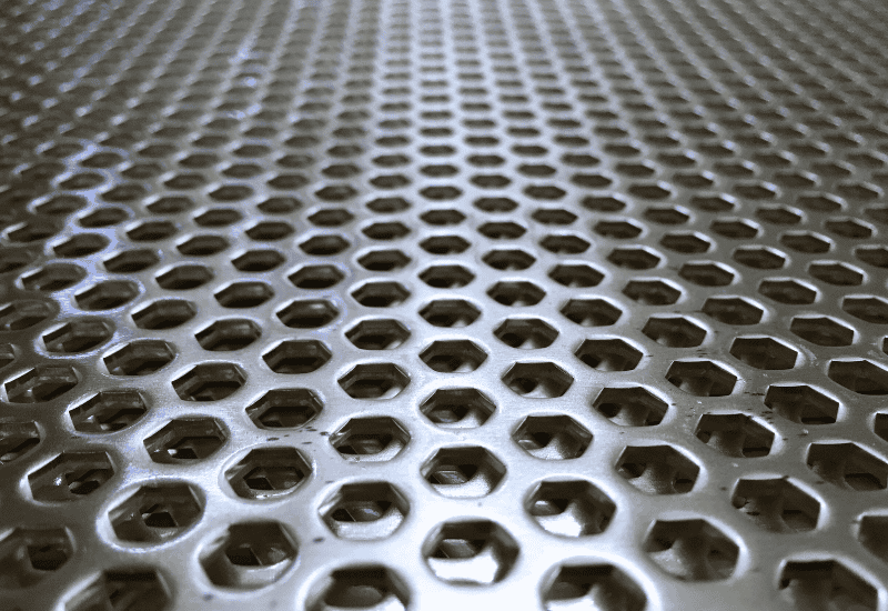 Graepel's heavy punch plate in hexagonal perforation close up image