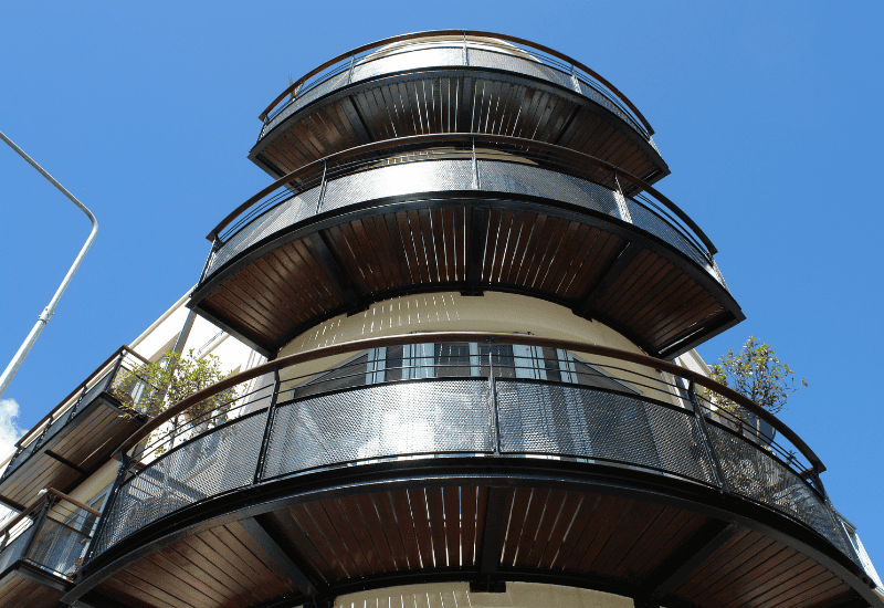 Curved perforated metal balustrade infill