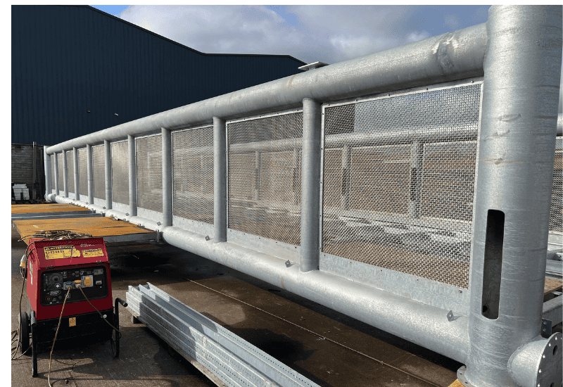 Woven wire mesh infills for pedestrian bridge, turnkey solutions