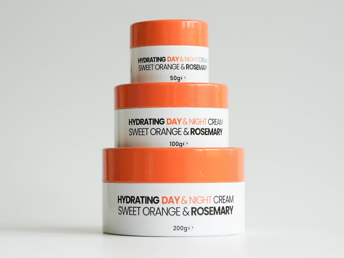 Hydrating tallow skincare cream with organic sweet orange and rosemary extracts.