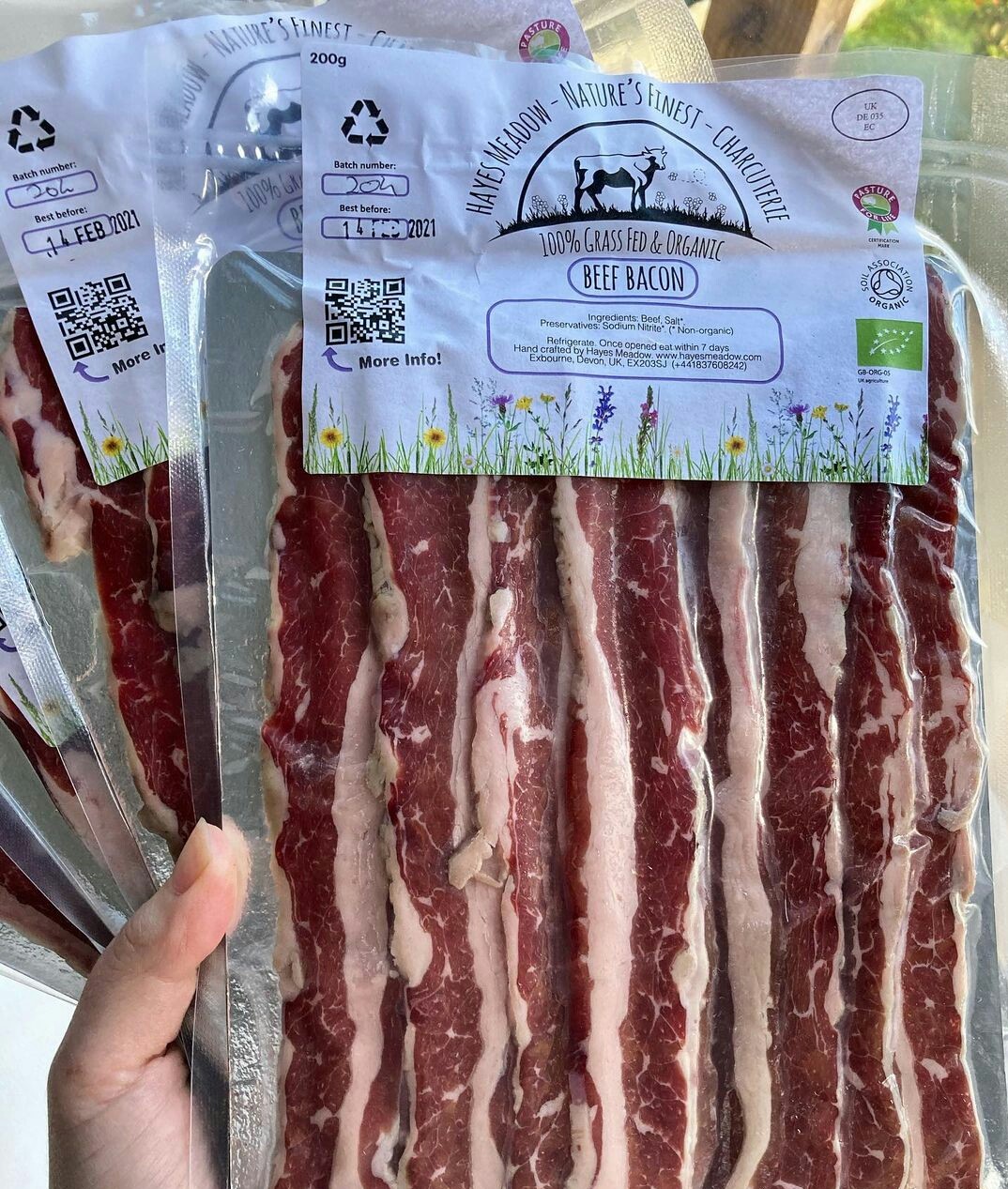 Organic grass-fed beef bacon in resealable packaging, ideal for tallow skincare products.